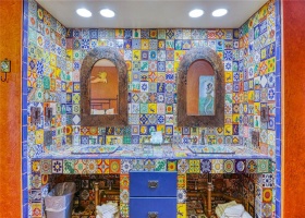 Beautiful custom, hand painted Spanish tiles in Bathroom area!