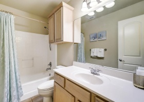 Second bathroom with tub/shower combination.