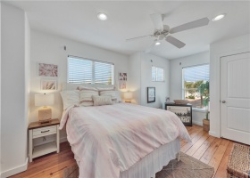 The first upstairs bedroom is bright and roomy and can accommodate a king bed