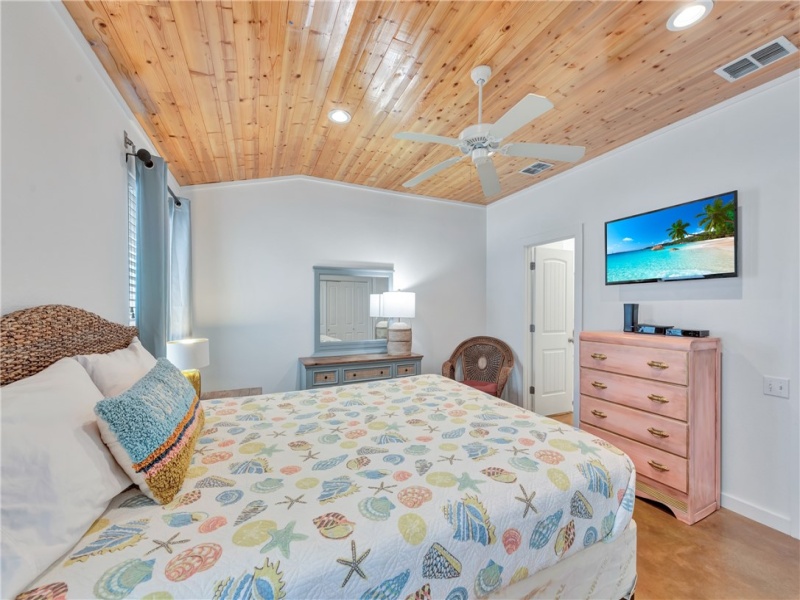 The master bedroom is spacious and bright and has its own private bath