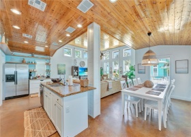 The main floor is light and bright with coastal decor