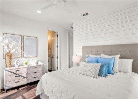 King sized bed situated beautifully in this Master Suite
