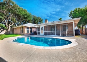Inground heated/chilled pool & screened in patio