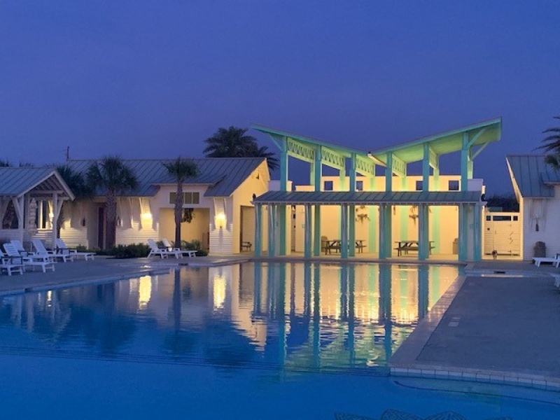 Evening view of beach entry pool