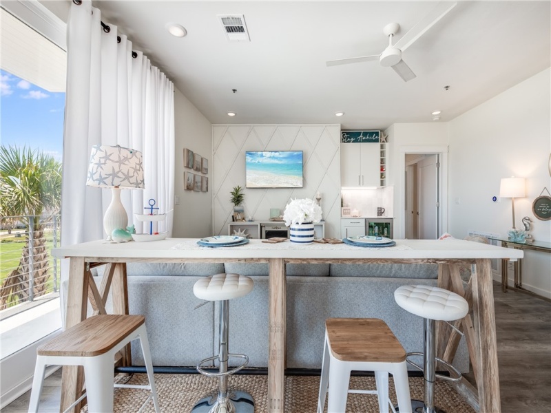 View from kitchen to living - accent wall in living