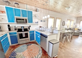 Kitchen with painted cabinets and appliances