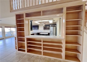 Multiple built in shelf spaces.