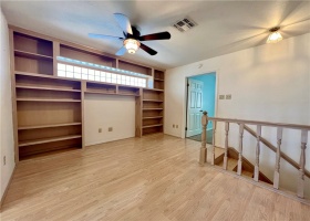 Guests rooms are separated by an upstairs living room. Lots of built in storage.