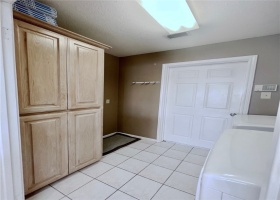 More storage in laundry room and space for a freezer or refridgerator.