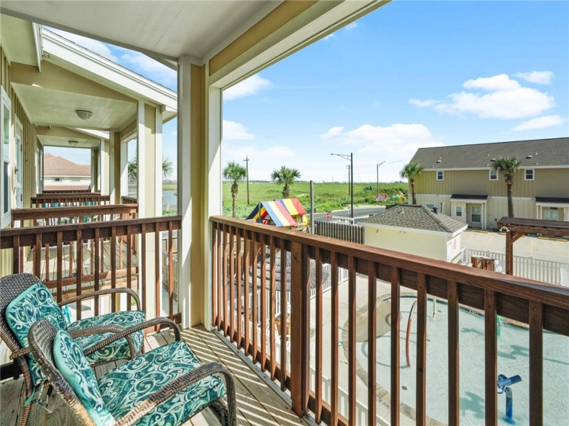 Patio that is accessible from the front Bedroom overlooking the Pool