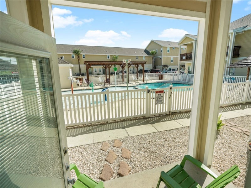 Looking out to the Pool area from the front door.