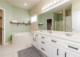 Primary bathroom with double sings and jetted tub