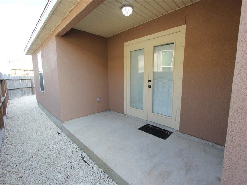 Side porch and side yard.