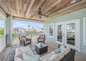 Upstairs covered patio with views of canal