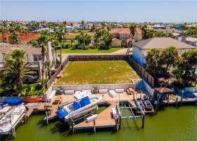 Large Lot with 2 boat lifts and jet ski pad.