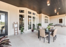 REAR PATIO W/10 FOOT CEILING, FIREPLACE & KITCHEN