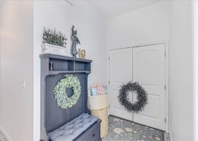 Laundry on first floor behind doors with wreath