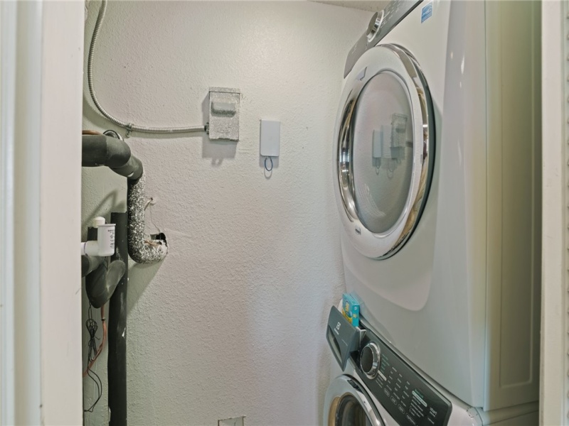 Washer dryer off of kitchen.