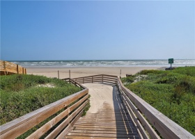 Boardwalk to the beach has golf cart access.