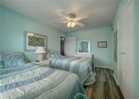 A great guest room with soothing coastal colors.