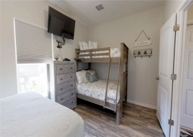 Second bedroom has attached full bath.