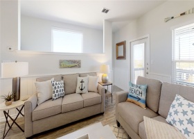 Open living area with queen size sofa sleeper.