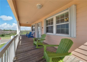 Enjoy sipping your coffee on the deck off the front of the house.