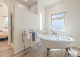 Primary Bathroom has claw foot tub, separate shower, separate water closet, double vanity and walk-in closet