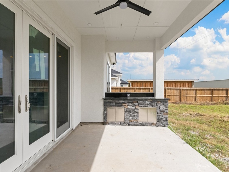 Backyard with sliding back doors