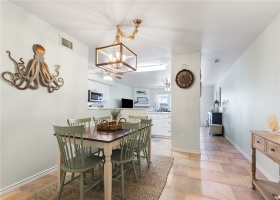 Dining area leading into kitchen.