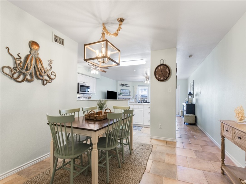 Dining area leading into kitchen.