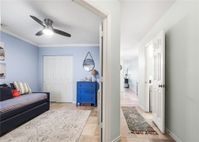 Entry hall with bedroom and powder room on the bottom level.